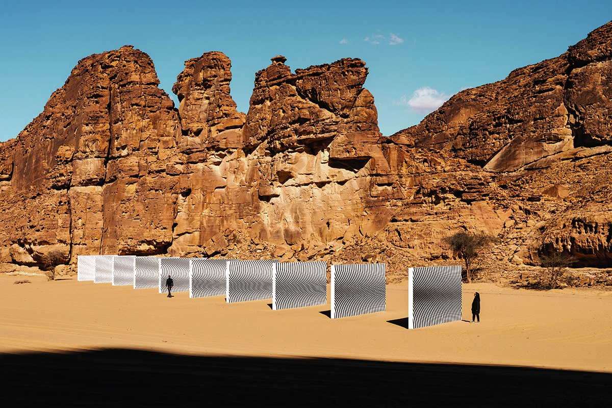 silver sculptures in a desert
