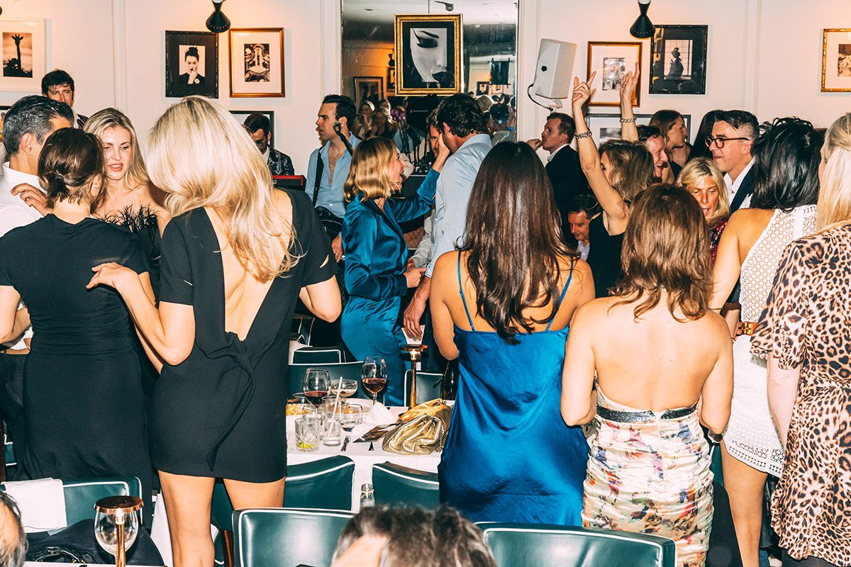 People dancing in a restaurant