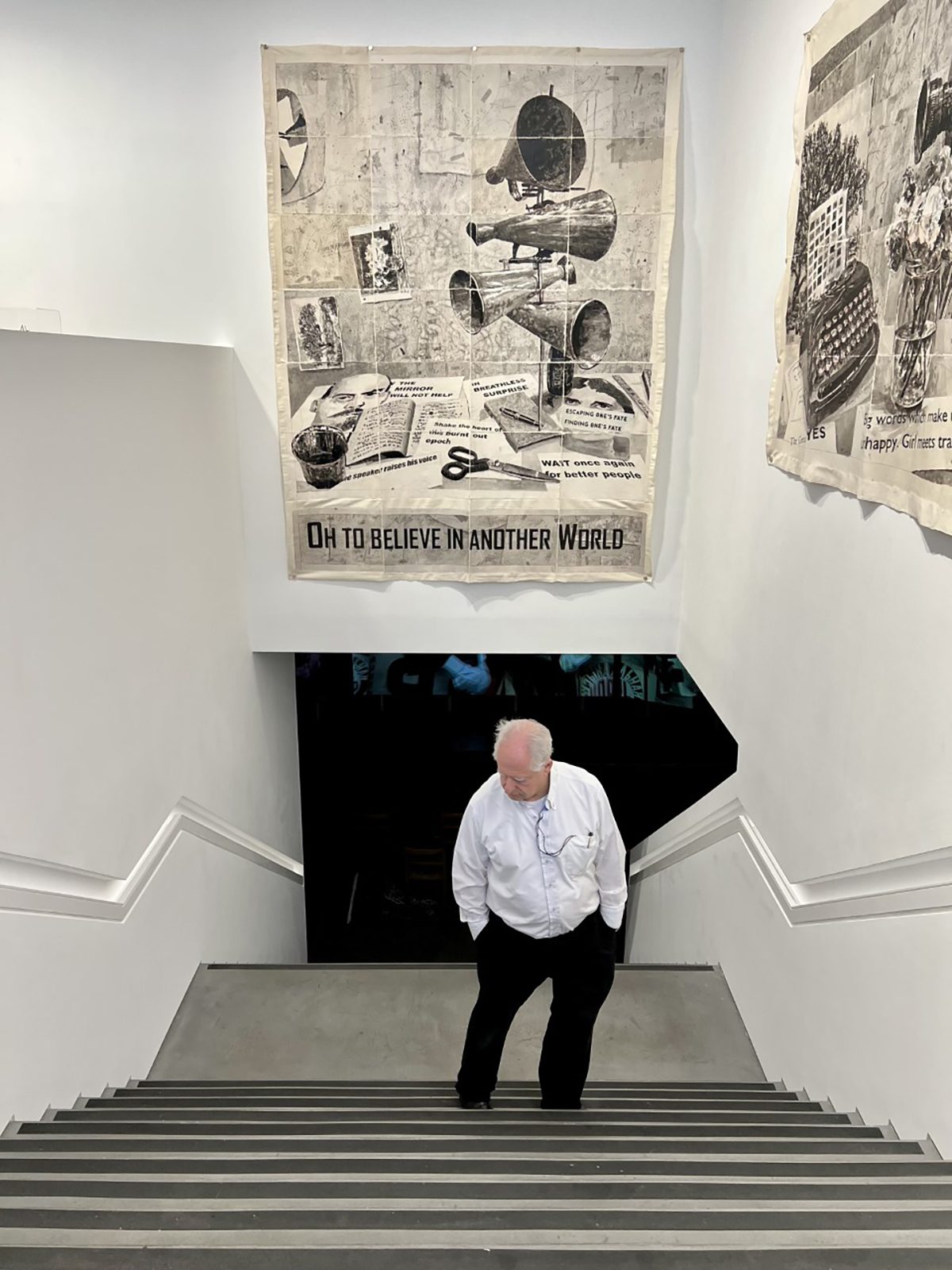 A man standing on some steps looking down