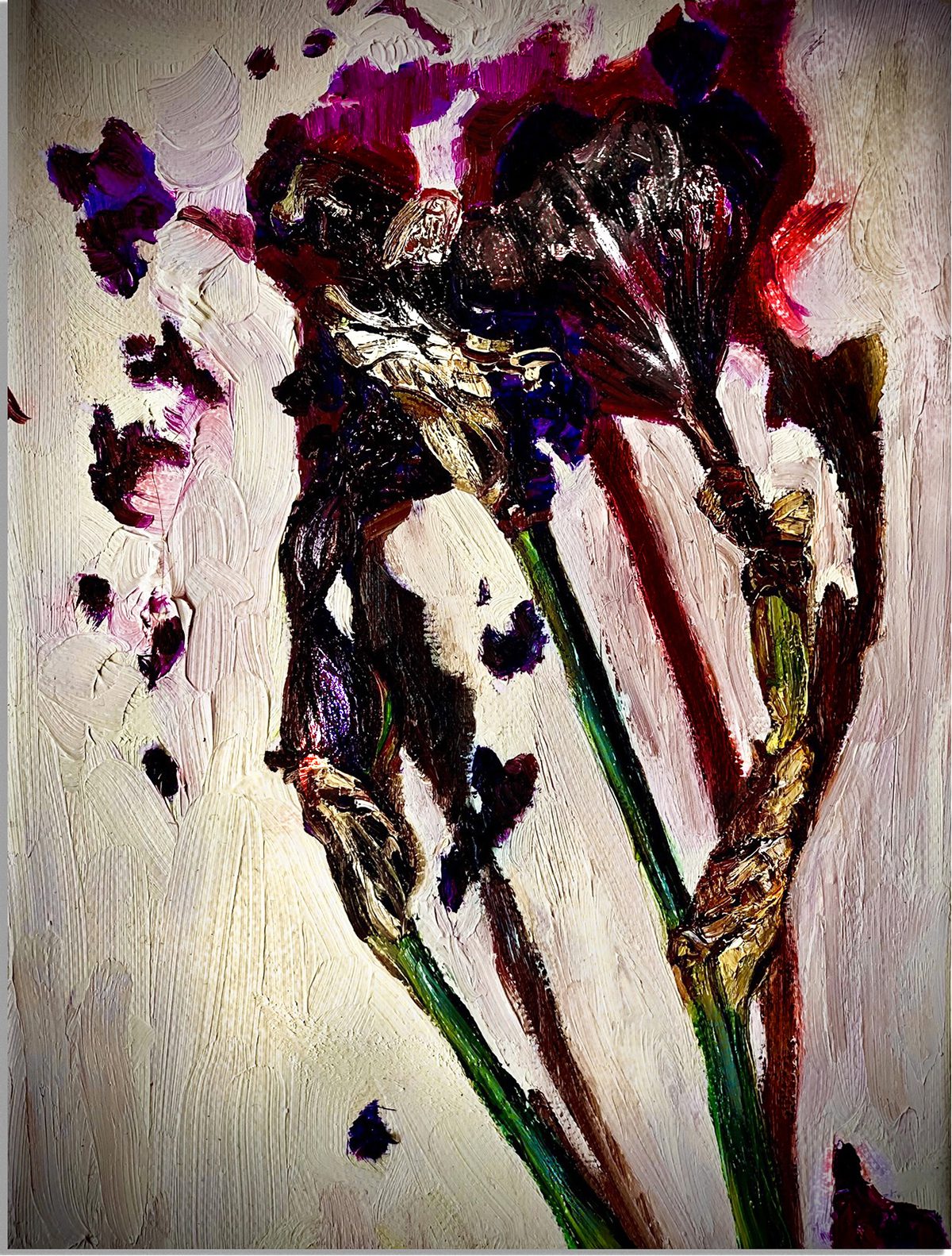 Dark red splattered paint on a canvas