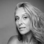 A woman with long wavy hair
