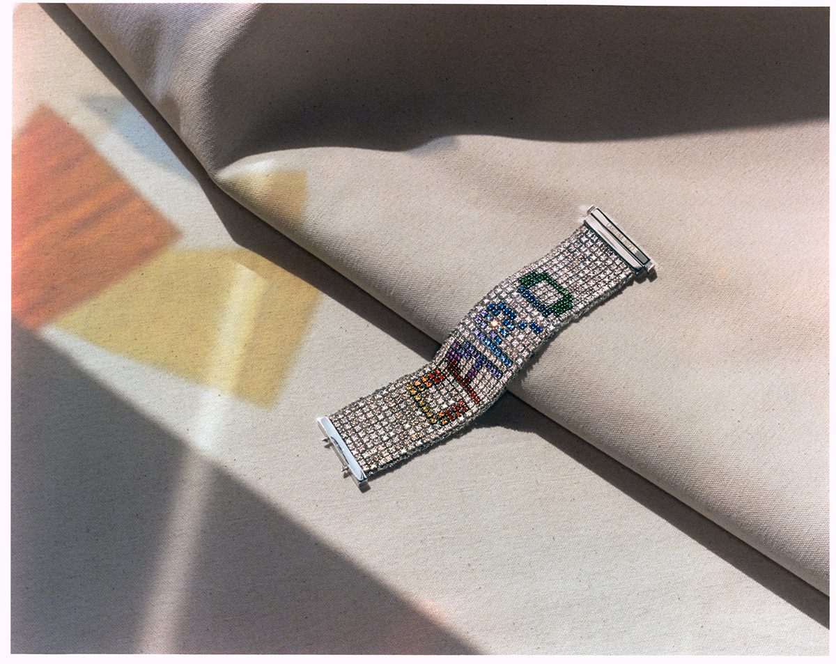 A diamond and sapphire bracelet with CARO weaved into it