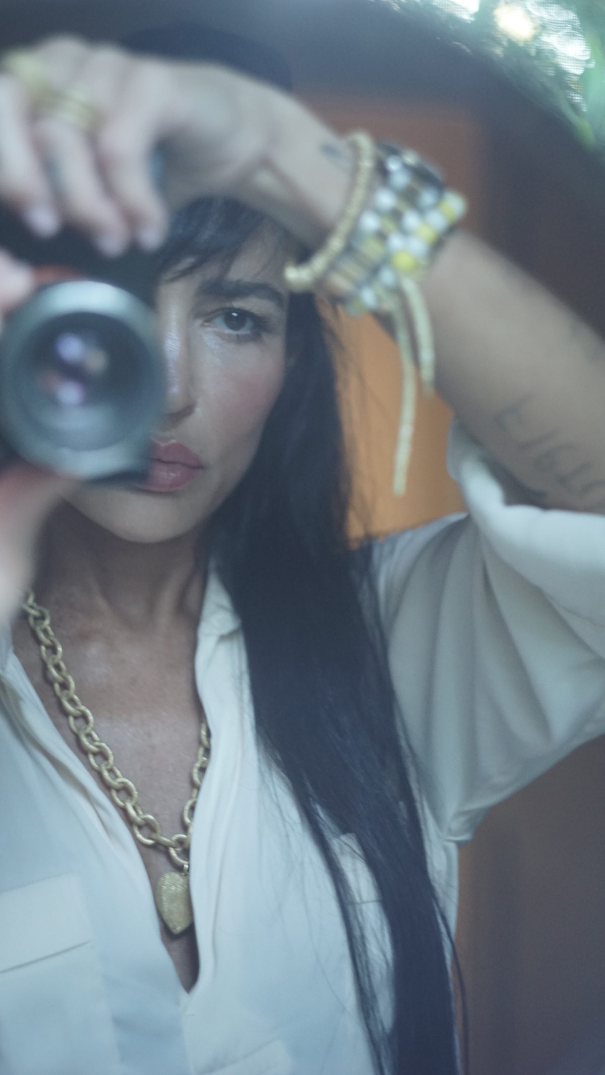 A woman taking a photo with a camera