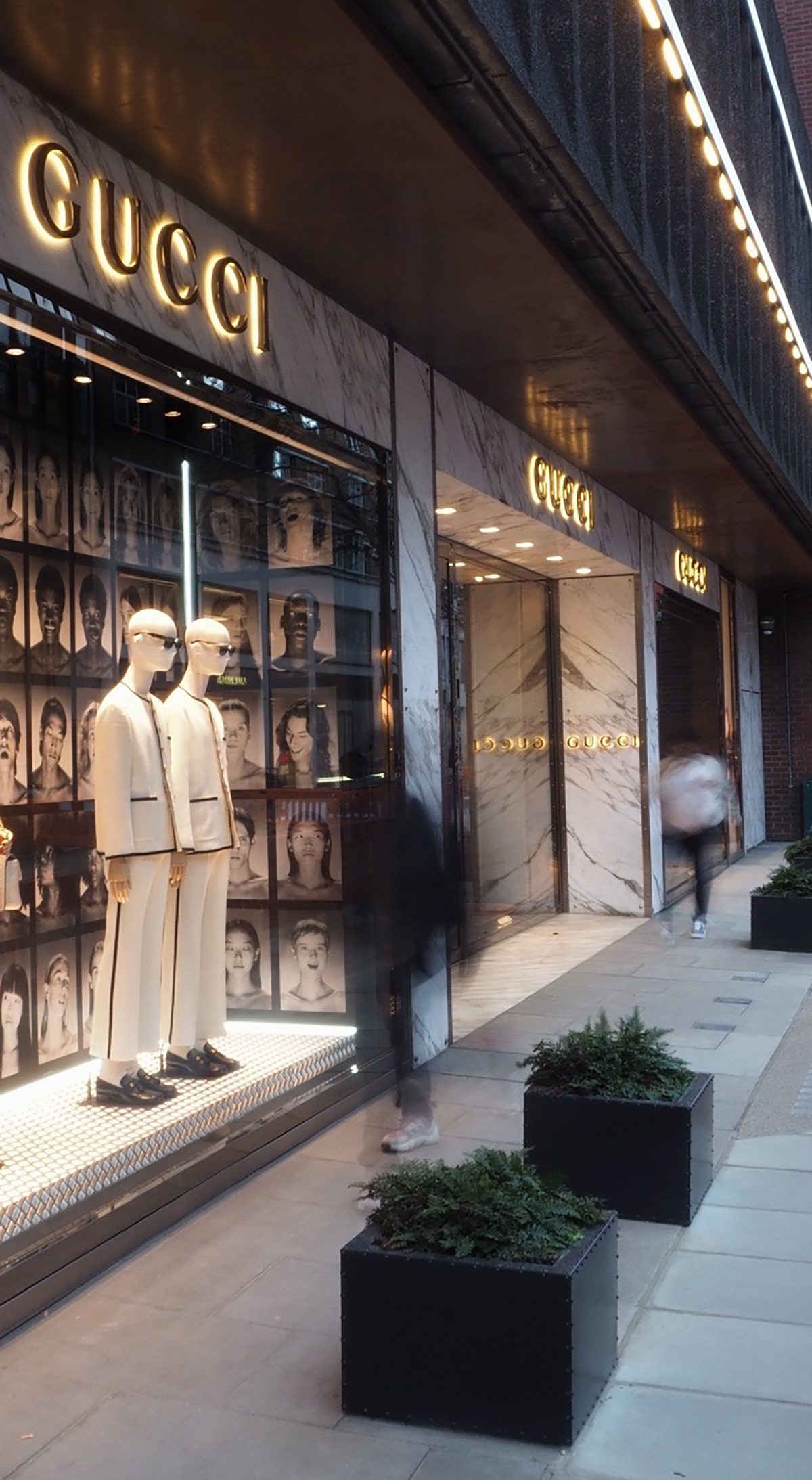 The outside window of a Gucci store