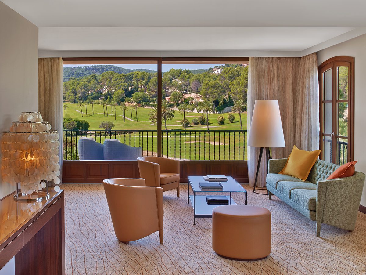 A room with a view of a golf course