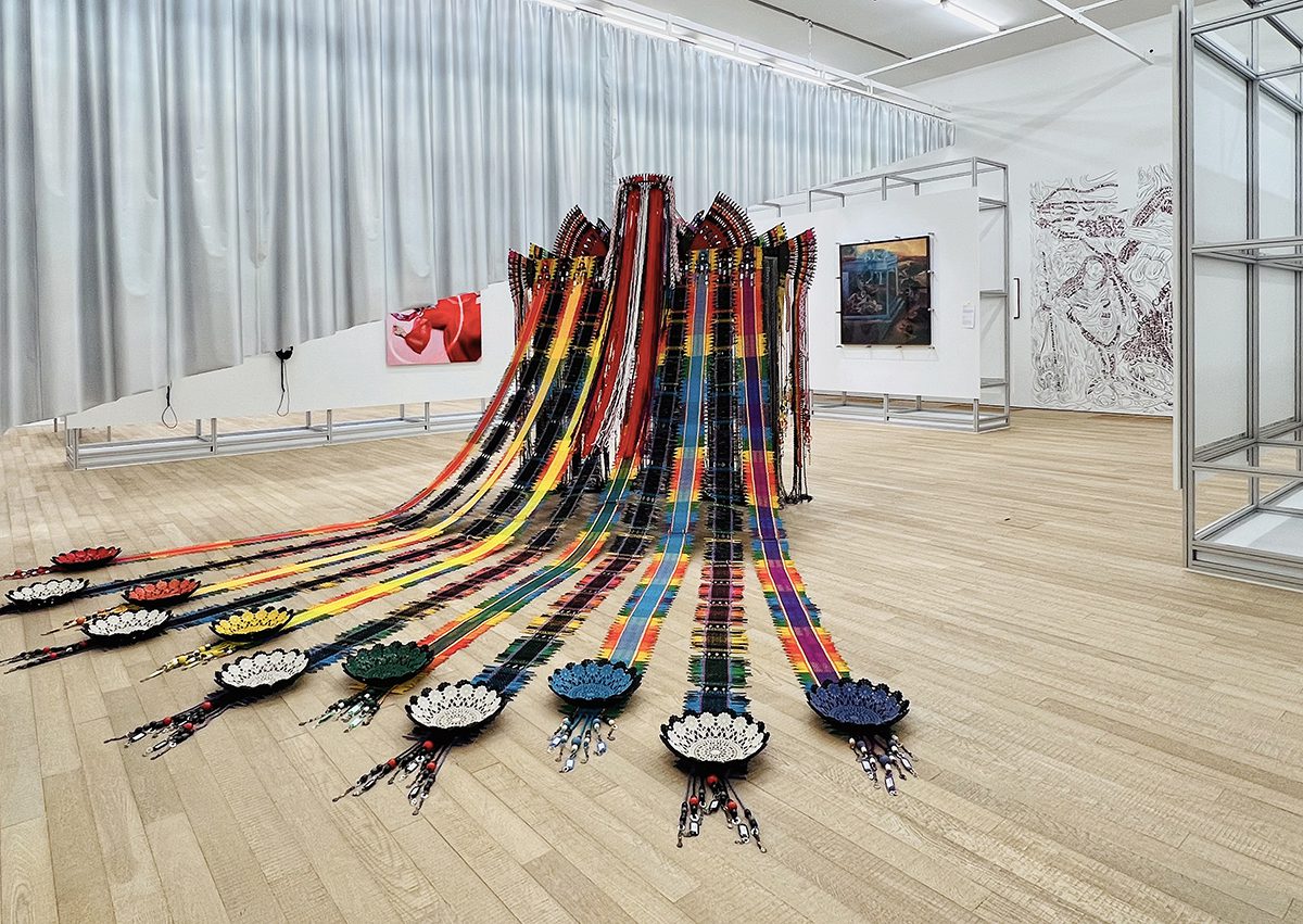 colourful embroidery and bowls laid on the floor