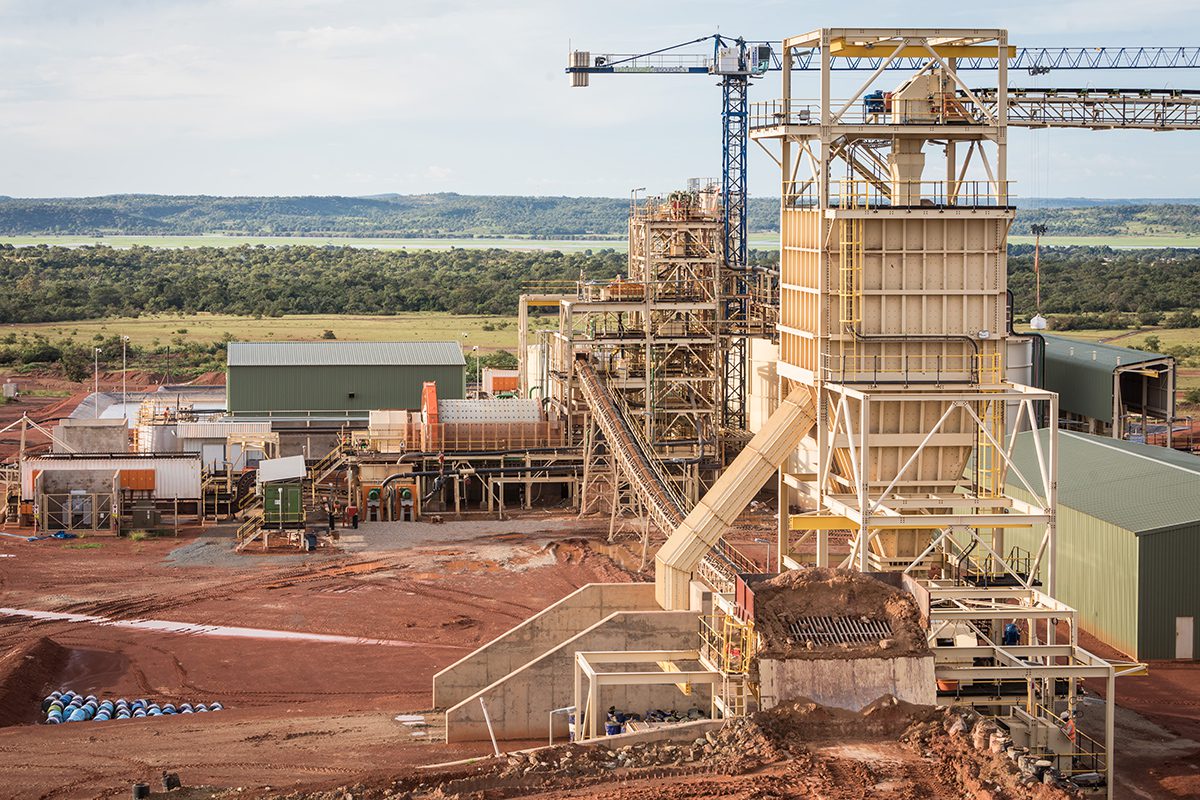A mine with cranes and scaffolding 