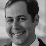 A man wearing a suit and tie