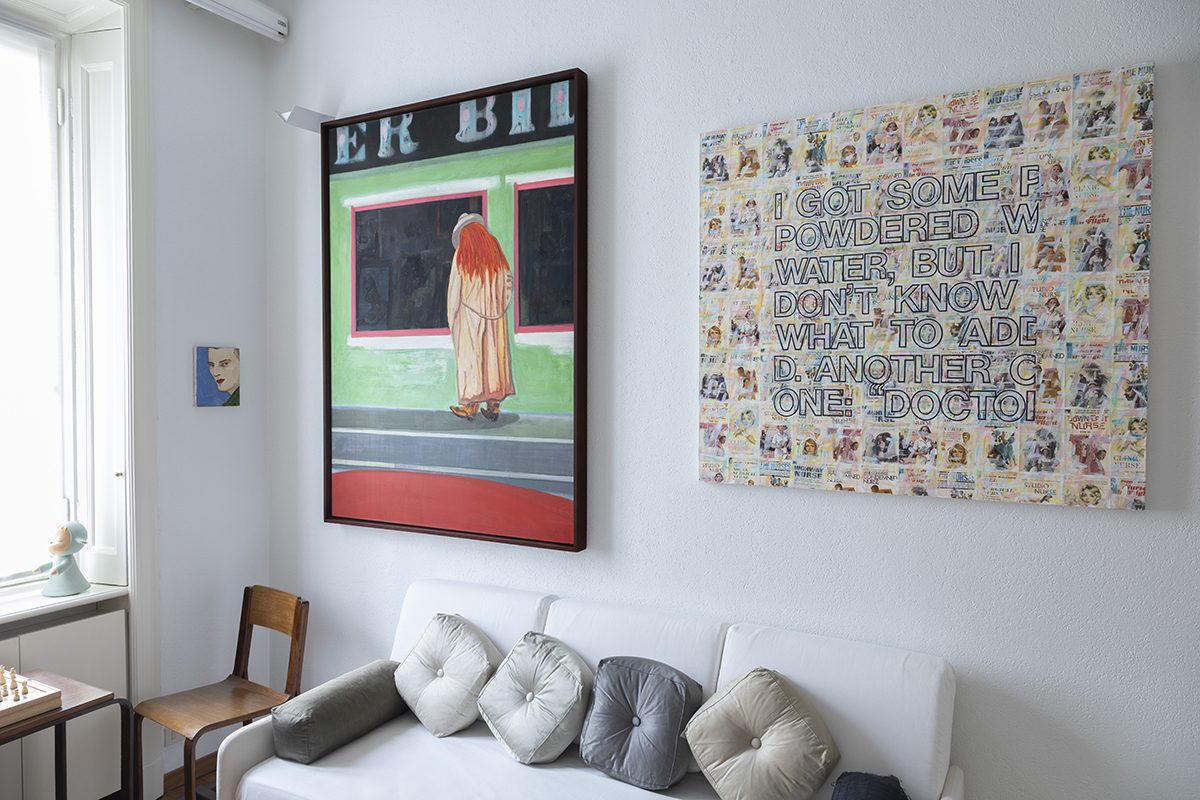 Two pieces of art hanging on a wall