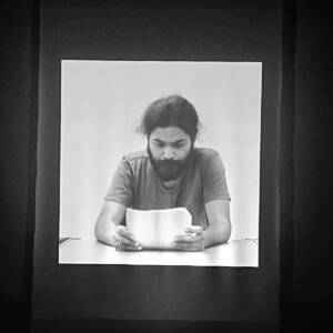 black and white picutre of man head down