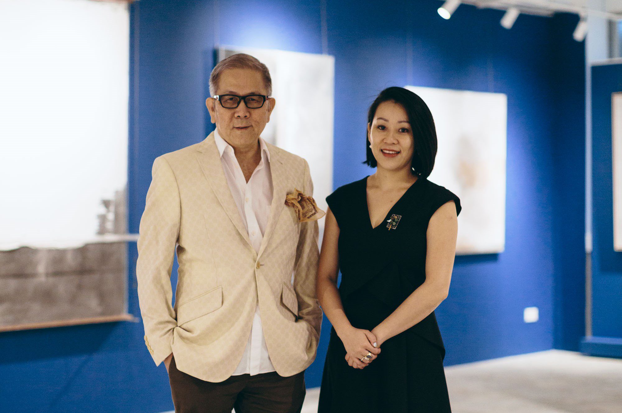 Man and woman standing next to each other