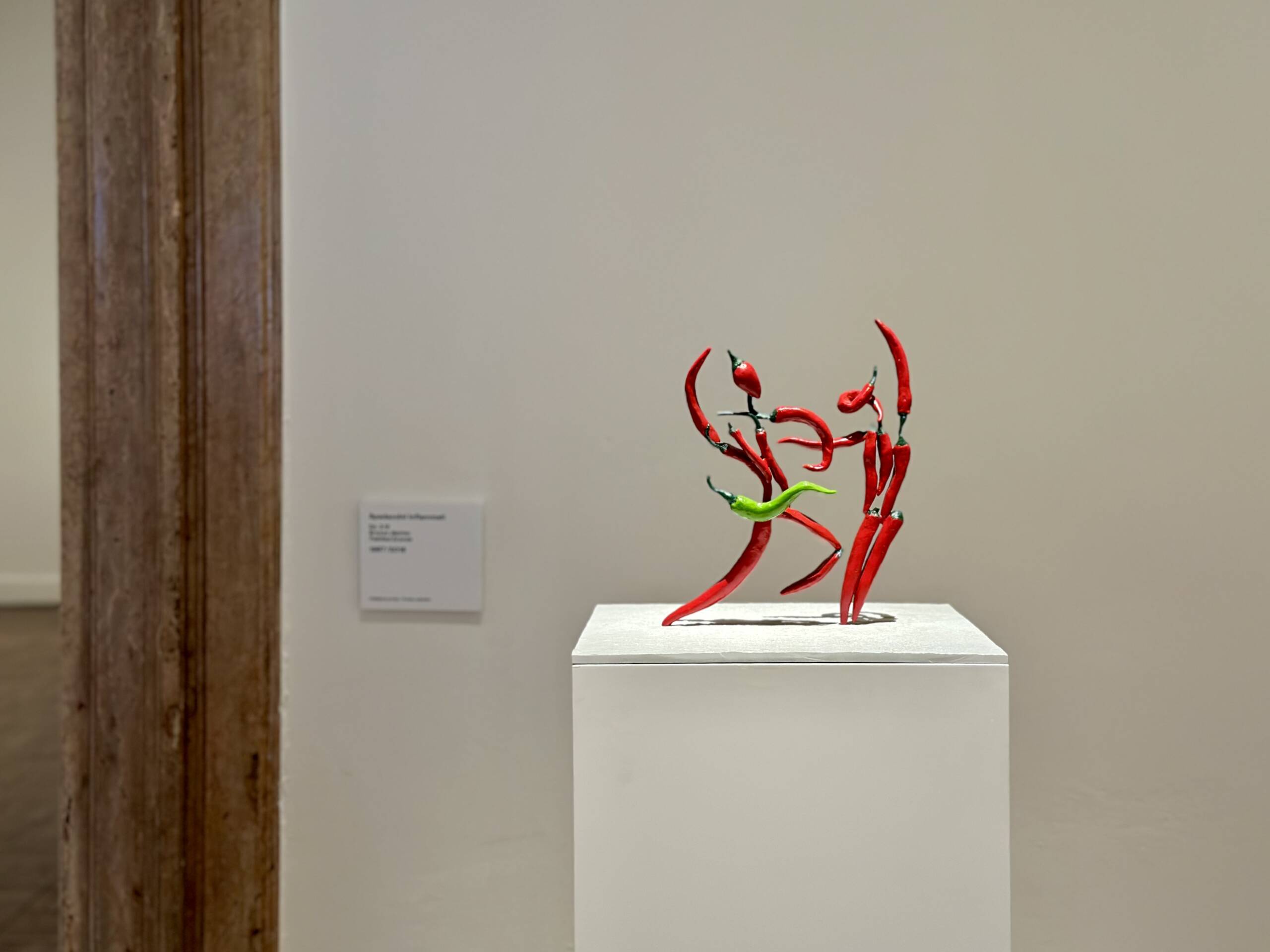 chilli on a plinth in a gallery