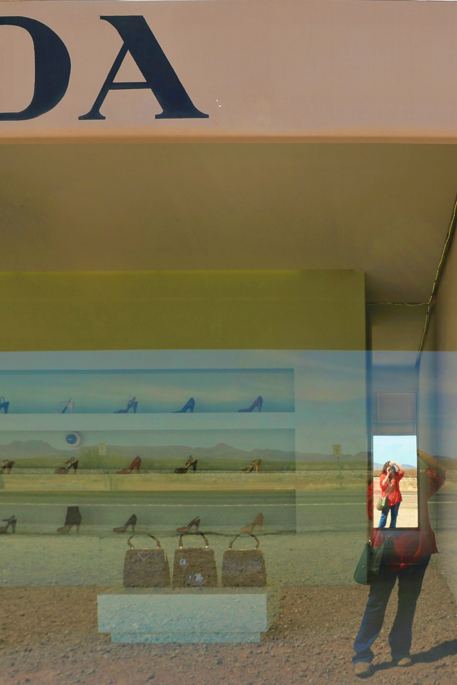 Prada shop with photographer photographing