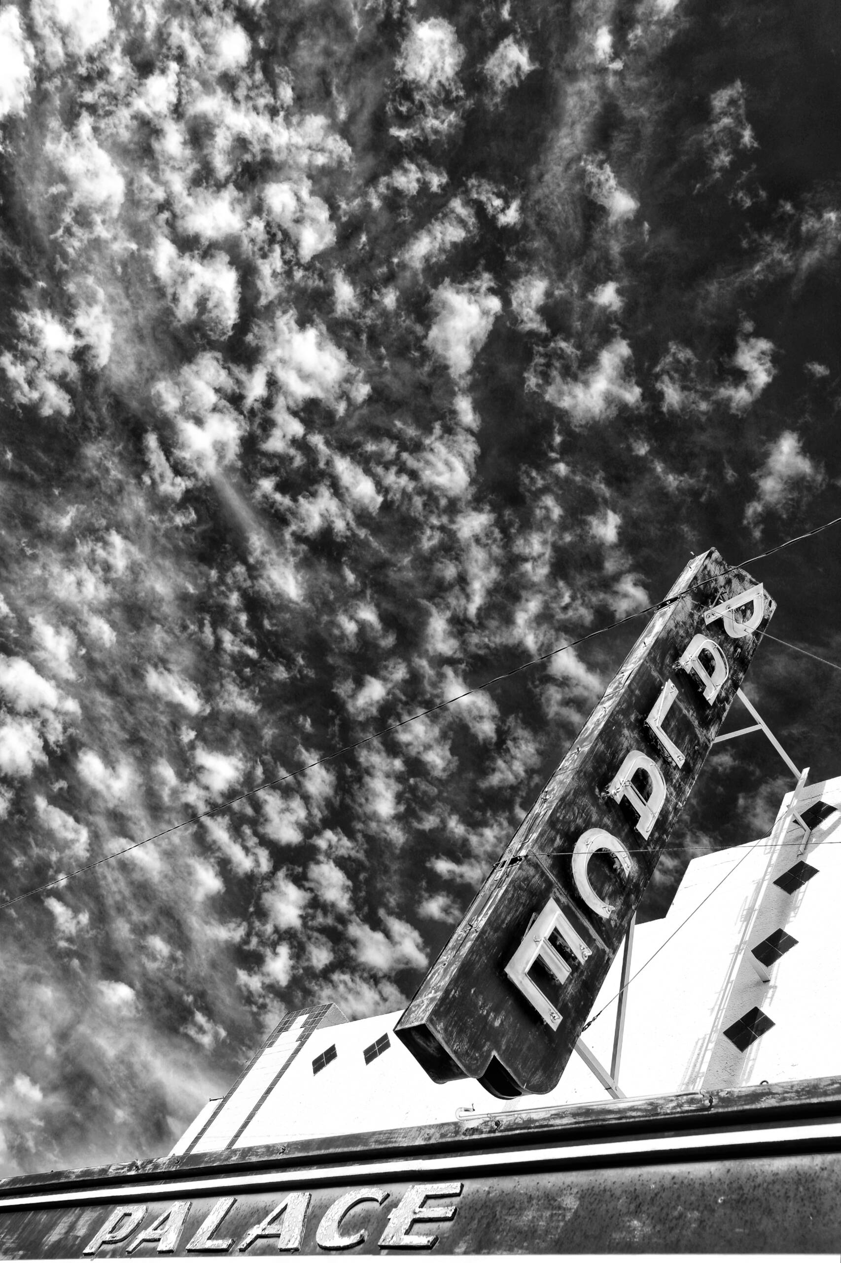 Sky with an old crumbling sign