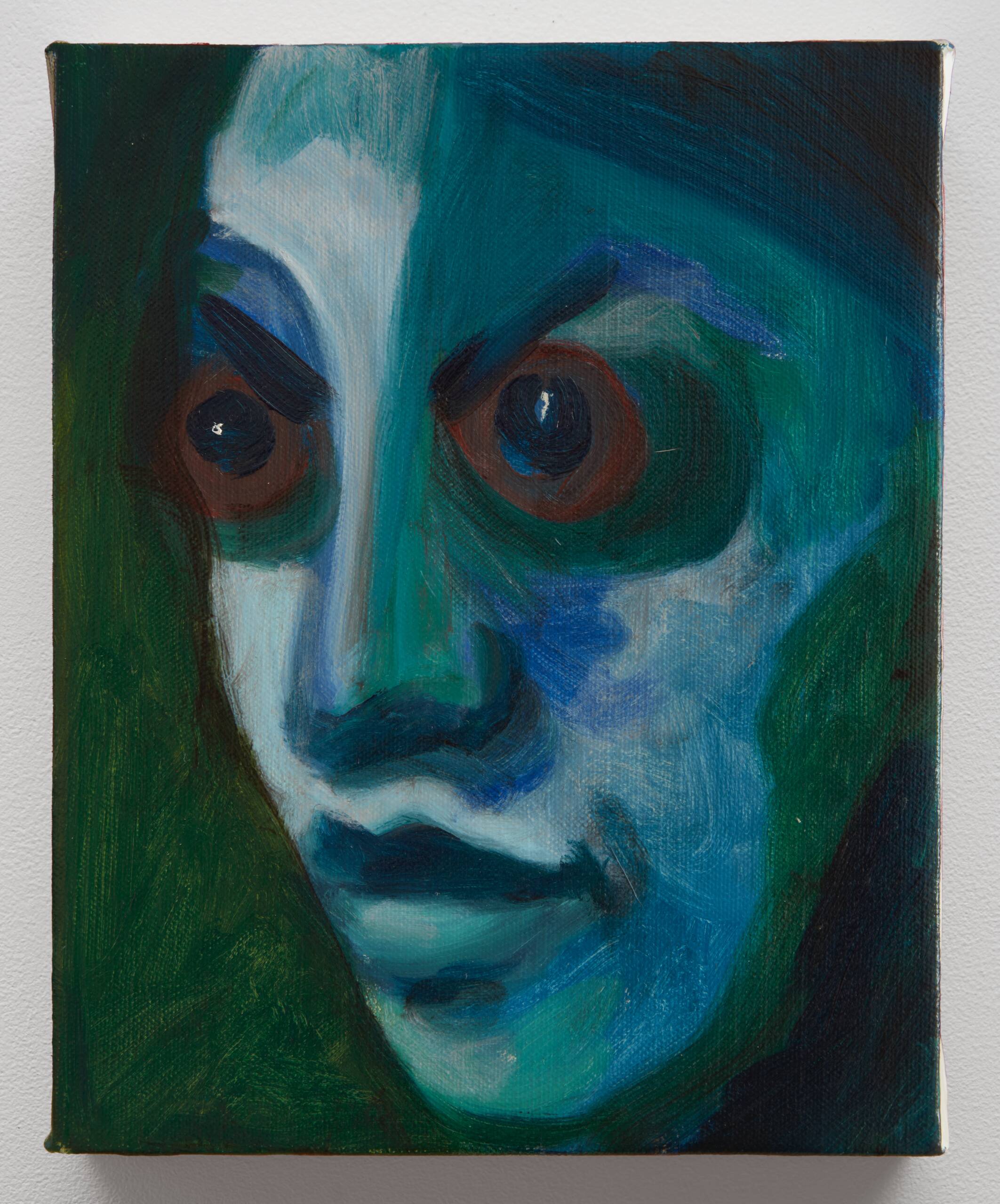 a blue face with brownish red wide eyes, pointy eyebrows and a long nose